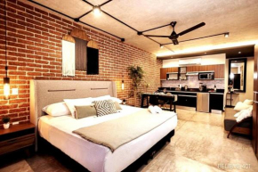 Apartamento con alberca en Rooftop, lavandería, WIFI rápido. Cerca de todo.